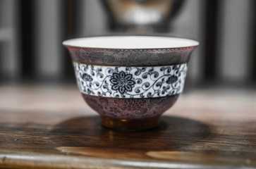 Porcelaine cup with flower pattern.  Cup for chinese traditional tea ceremony.