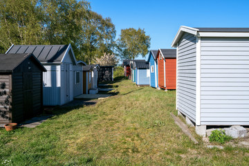 Fototapeta na wymiar Small beach houses in Ystad city in Skane, Sweden