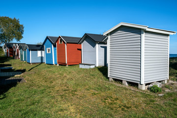 Fototapeta na wymiar Small beach houses in Ystad city in Skane, Sweden