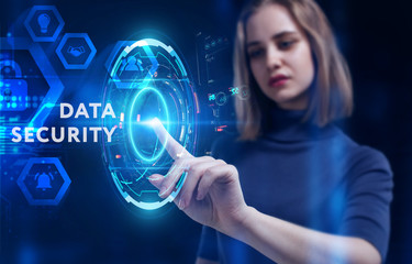 Business, Technology, Internet and network concept. Young businessman working on a virtual screen of the future and sees the inscription: Data security