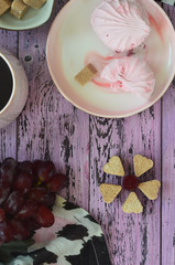 Dessert marshmallows grapes and brown sugar top view