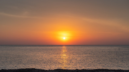 Fototapeta na wymiar Sunset, Sundown over the ocean, sea at dusk.