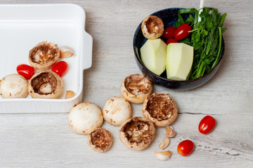 Fresh vegetables on the kitchen table for cooking.