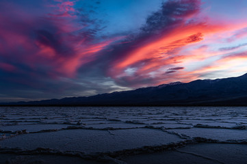 Dramatic sunset over salt fats in Death Valley
