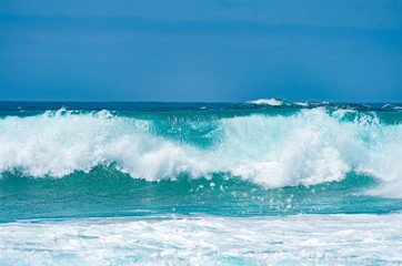 Beautiful crashing wave on a sunny California day