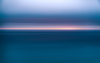 Abstract long exposure seascape at sunset