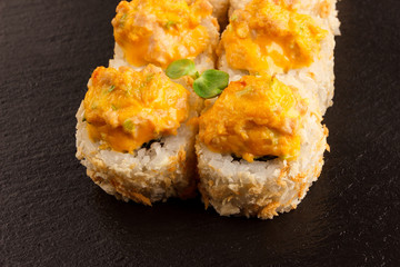 Japanese food: Set of salmon sushi and rolls with salmon and eel