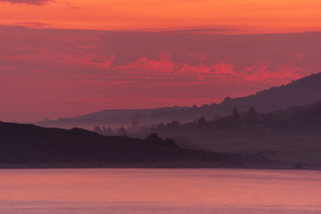 Fototapeta na wymiar Morning sunrise over the bay