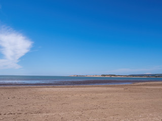 Deserted sandy beach, Instow, north Devon UK, No tourists. Tourism decimated by Coronavirus, Covid lockdown.