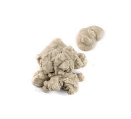 Sandy beach textured pile isolated on white background