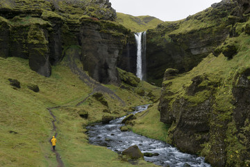 waterfall in the valley. located in iceland. you can go behind the waterfall. valley with waterfall like from a movie. Icelandic dream.