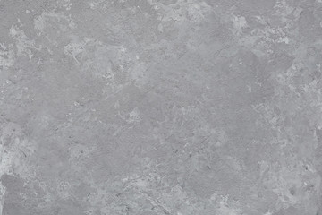 Texture of gray decorative stucco or concrete, concrete wall for background. Copy space, banner. Gray spots