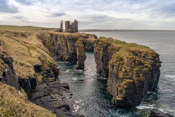 ruined castle on the caithness coast in scotland © Scott K Marshall