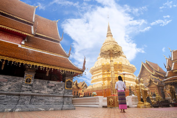 Fototapeta premium Portail of beautiful woman with traditional northern thai dress in temple
