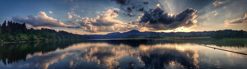 Sunset at a lake in the alpine foothills
