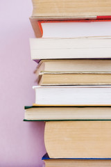 A stack of old books on a bookcase. Library, back to school