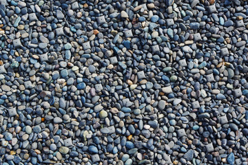 Background of blue sea stone. Pebble for decrorating the garden in a house. Rocks edge the river.