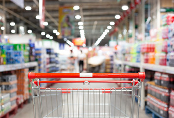 Shopping cart in supermarket, Abstract blurred photo in shopping malls, Cart in the market concept.