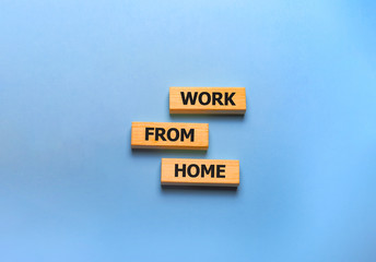 Work from home text on wooden blocks, blue background
