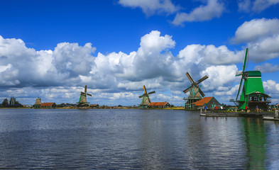 Fototapeta na wymiar Traditional Dutch windmills with canal close the Amsterdam, Holland