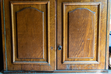 old wooden door with wooden shutters