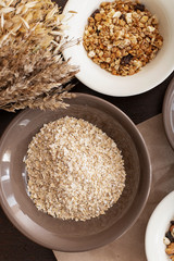 Oatmeal and granola in plates