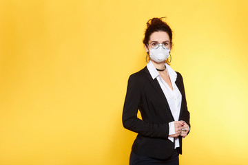 Business woman in glasses  wearing protective mask to Prevention for Coronavirus or Covid-19 Outbreak Situation - Concept, contagious disease, healthcare and Business.  Brunette