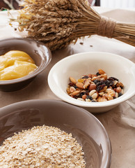 
Oatmeal, nuts and honey on the table