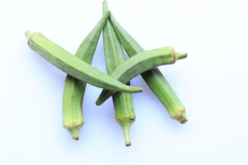 Fresh Young Lady Fingers or Okra in white background
