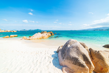 Gorgeous tropical beach turquoise transparent water unique rock boulders, Cam Ranh Nha Trang...