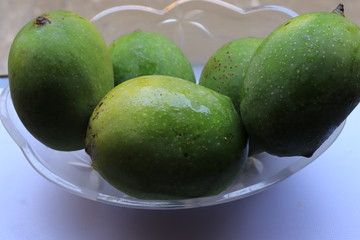 Fresh Green Mango fruit isolated on white background