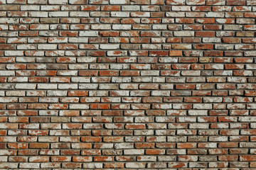 old brick wall with different bricks
