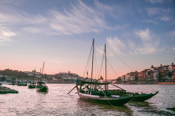 Panoramic landscape view on the old town with Douro river in Porto city during the sunset in Portugal
