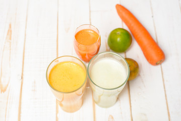 Healthy diet Fruits and vegetables juice ready to drink on wooden table
