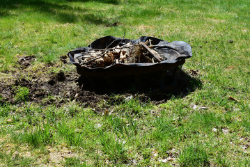 Old broken copper fire pit