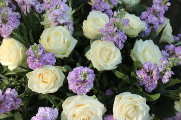 White and purple wedding centerpiece