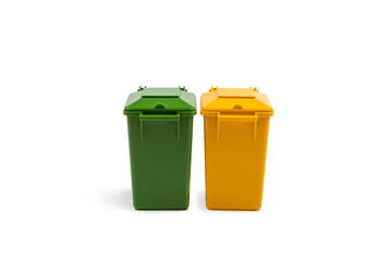 green and yellow trash cans on a white background