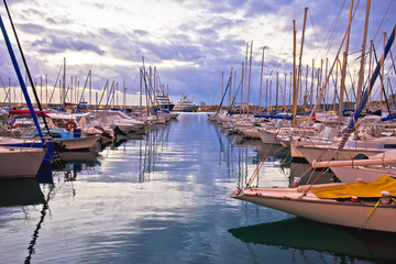 Fototapeta premium French riviera. Port Vauban harbor in Antibes colorful dusk view