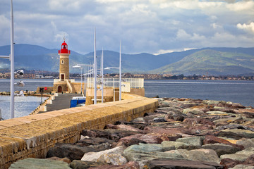 Saint Tropez, French riviera. Lighthouse and breakwater of Saint Tropez harbor