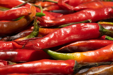 A close-up shot of a long-stored red chilies