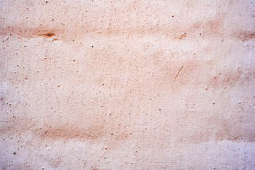 Texture of a concrete wall with cracks and scratches which can be used as a background