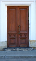 Big old light wooden door
