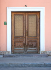 Big old light wooden door