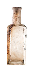 Vintage oil and tincture glass bottle weathered on white background. Old bottle with calcium deposits