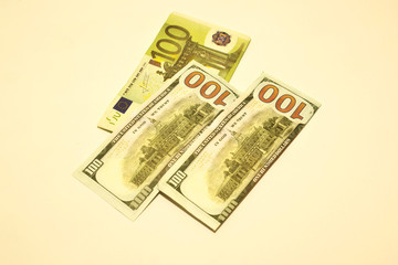 Banknotes dollars and euros, money on a white background