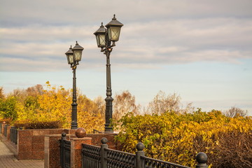 Street lamps on autumn embankment of city of Ulyanovsk