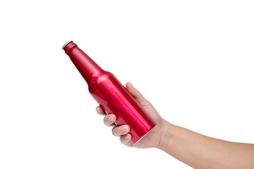 A hand hole a red bottle on white background with clipping path