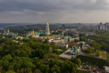 Obraz premium Aerial view of Kiev Pechersk Lavra illuminated by the sunset rays of the sun, Kyiv, Ukraine