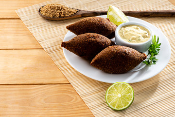 Delicious fried kibbeh. Also popular party dish in Brazil, Kibe.