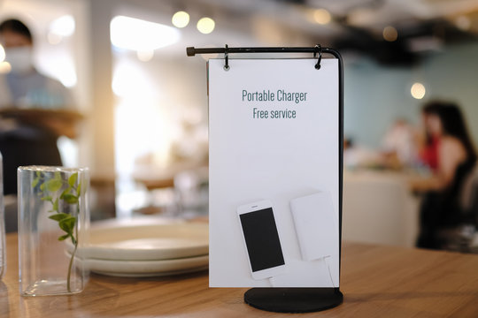 Portable charger free service sign in cafe.